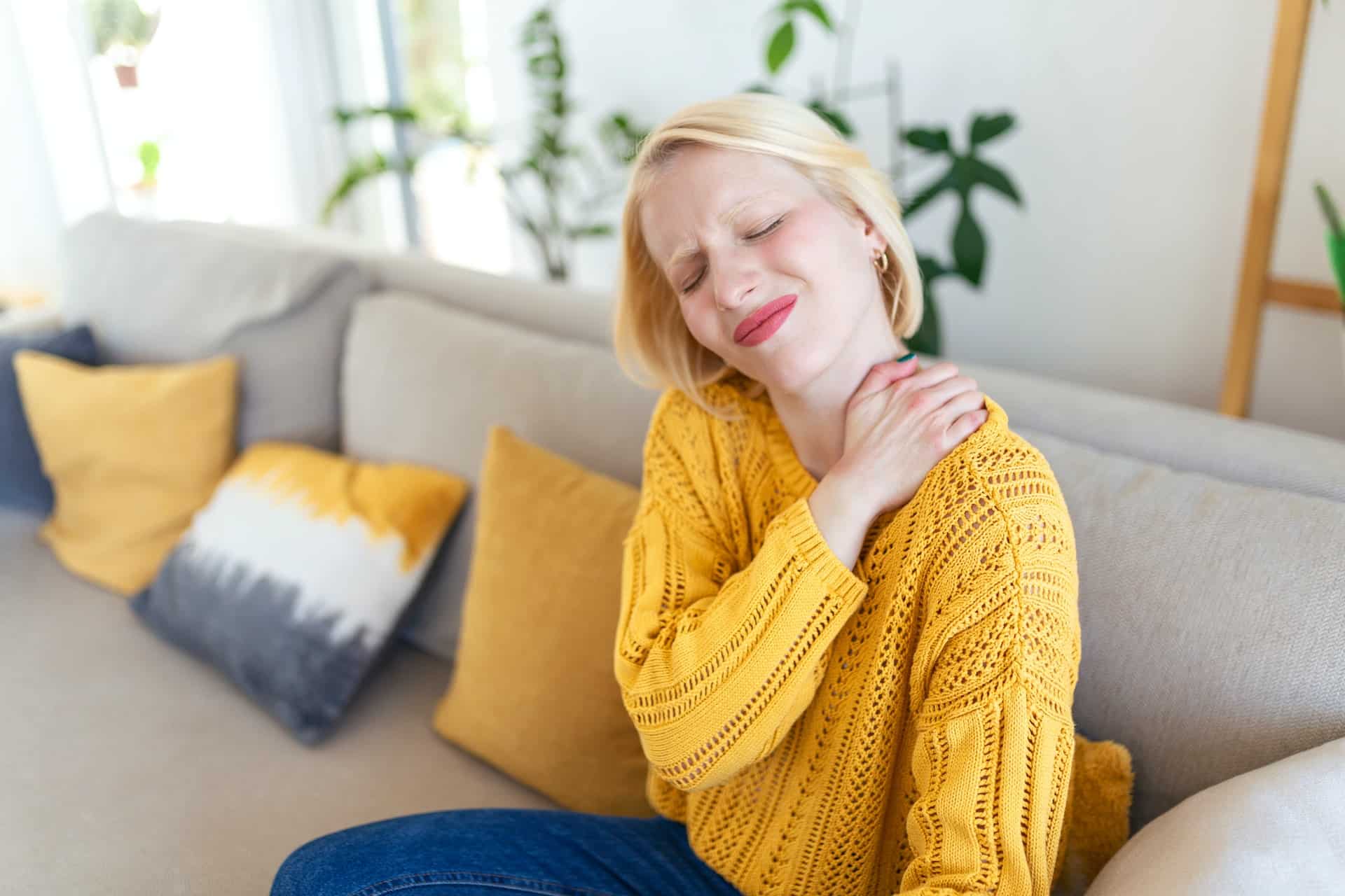 woman experiencing back pain