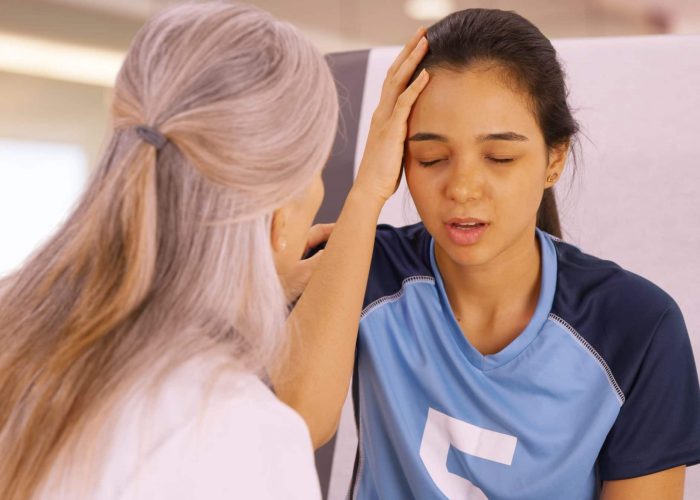 A,Concussed,Soccer,Player,Seeks,Help,At,The,Doctors,Office